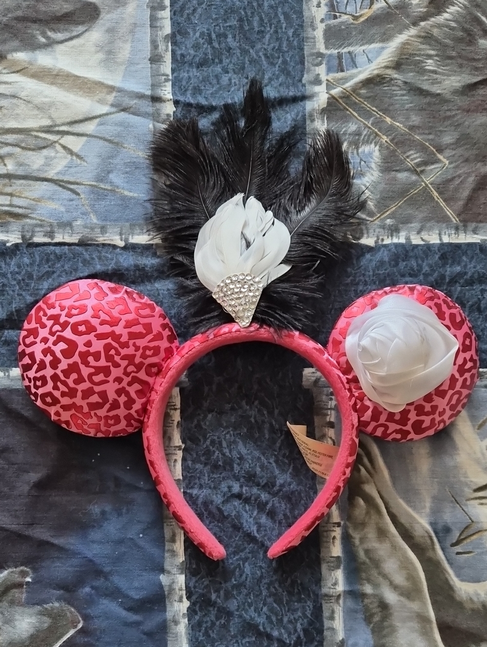 Disney Parks Pink Leopard Print Minnie Ear Headband with Black Feather Accent